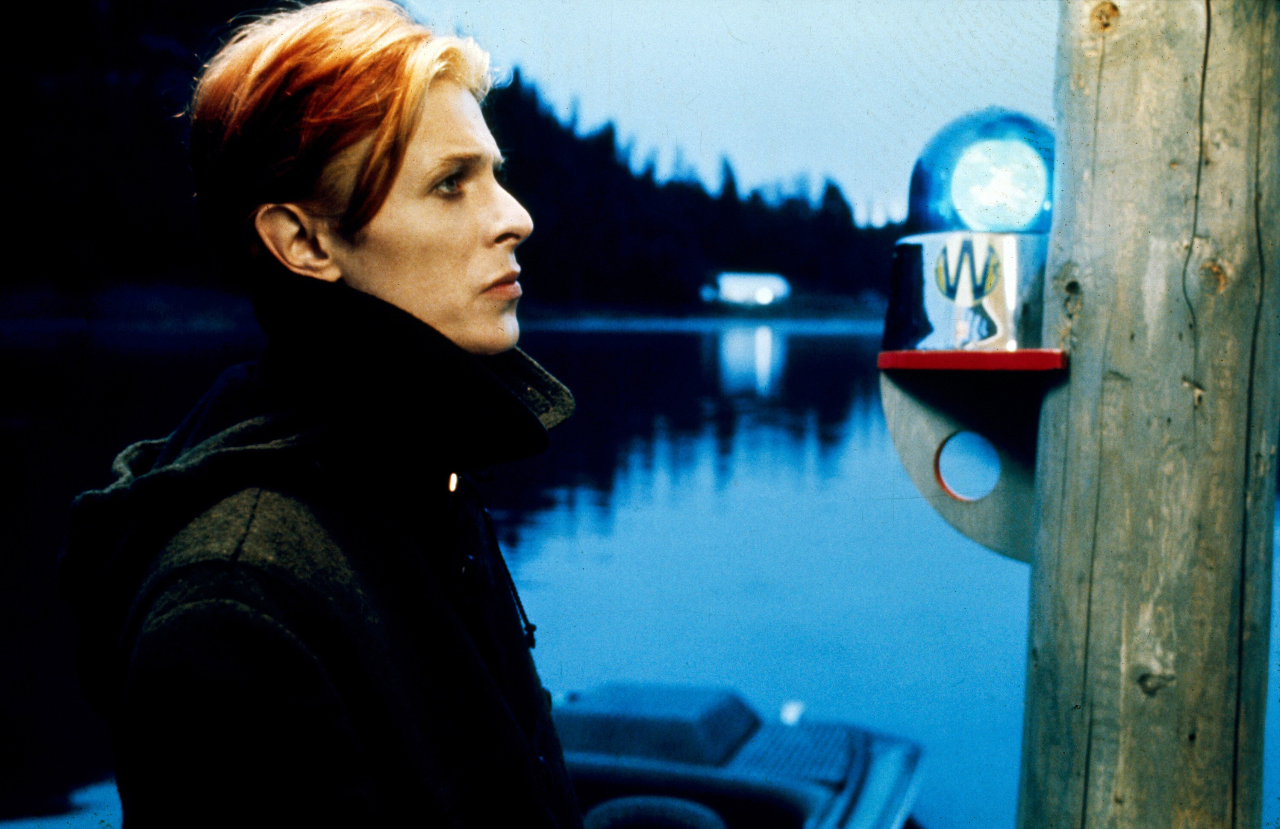 David Bowie as Thomas Jerome Newton, an alien visitor newly arrived on Earth in The Man Who Fell to Earth (1976)