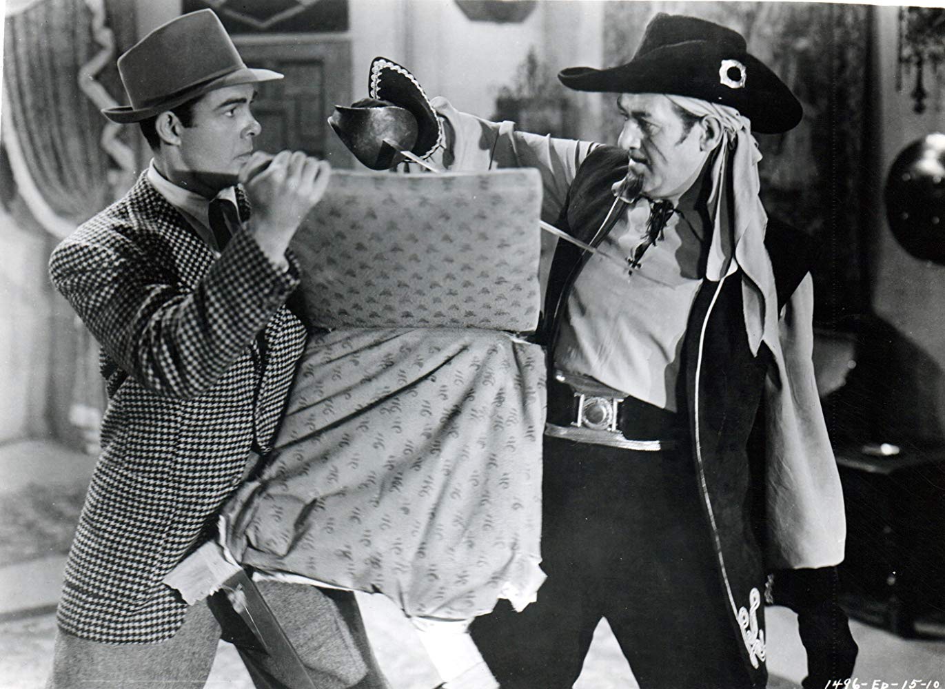 (l to r) Criminologist Lance Reardon (Richard Bailey) fights the villainous Captain Mephisto (Roy Barcroft) in Manhunt of Mystery Island (1945)