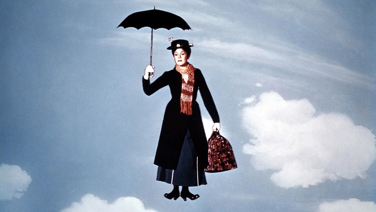 Mary Poppins (Julie Andrews) arrives, blown in on the wind by her umbrella in Mary Poppins (1964)