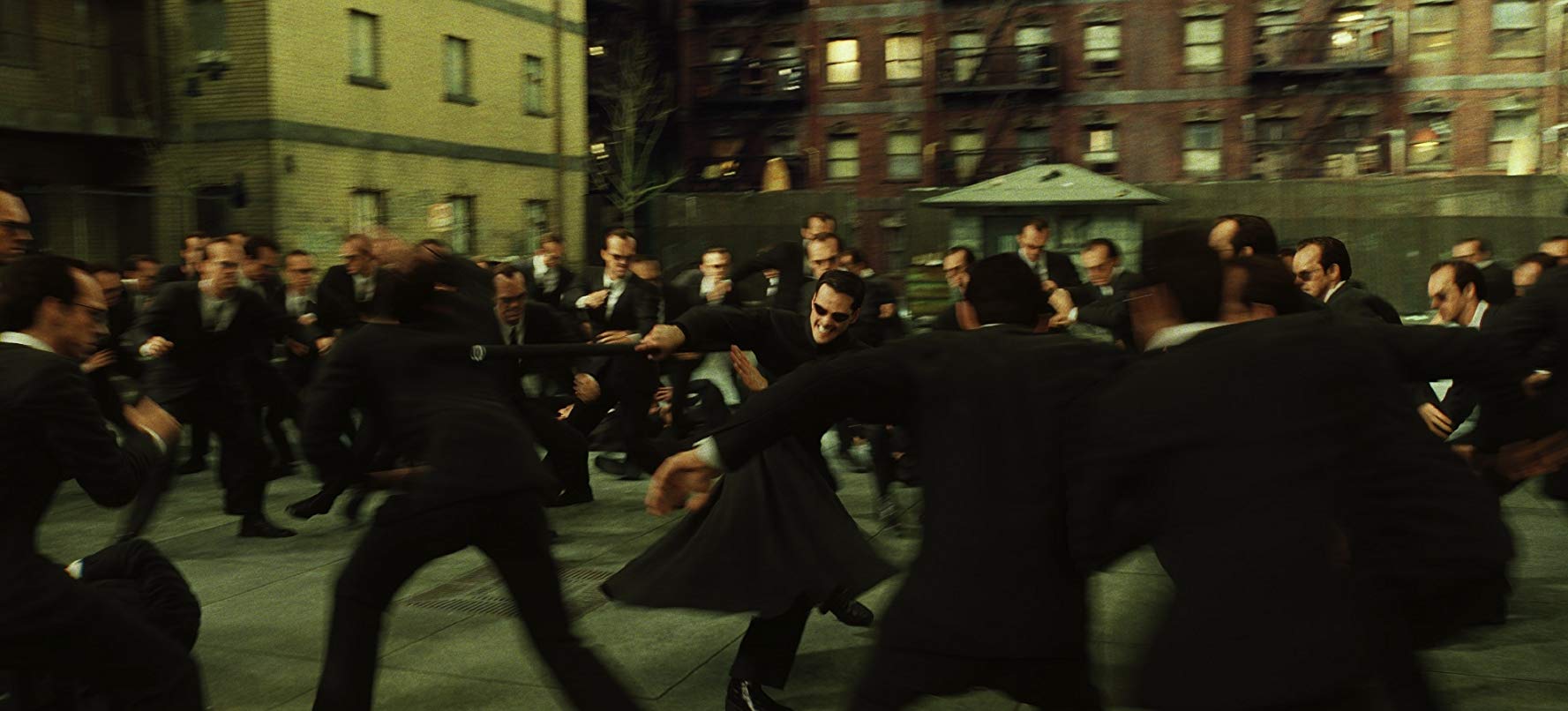 Neo (Keanu Reeves) vs hundreds of Agent Smiths (Hugo Weaving) in The Matrix Reloaded (2003)