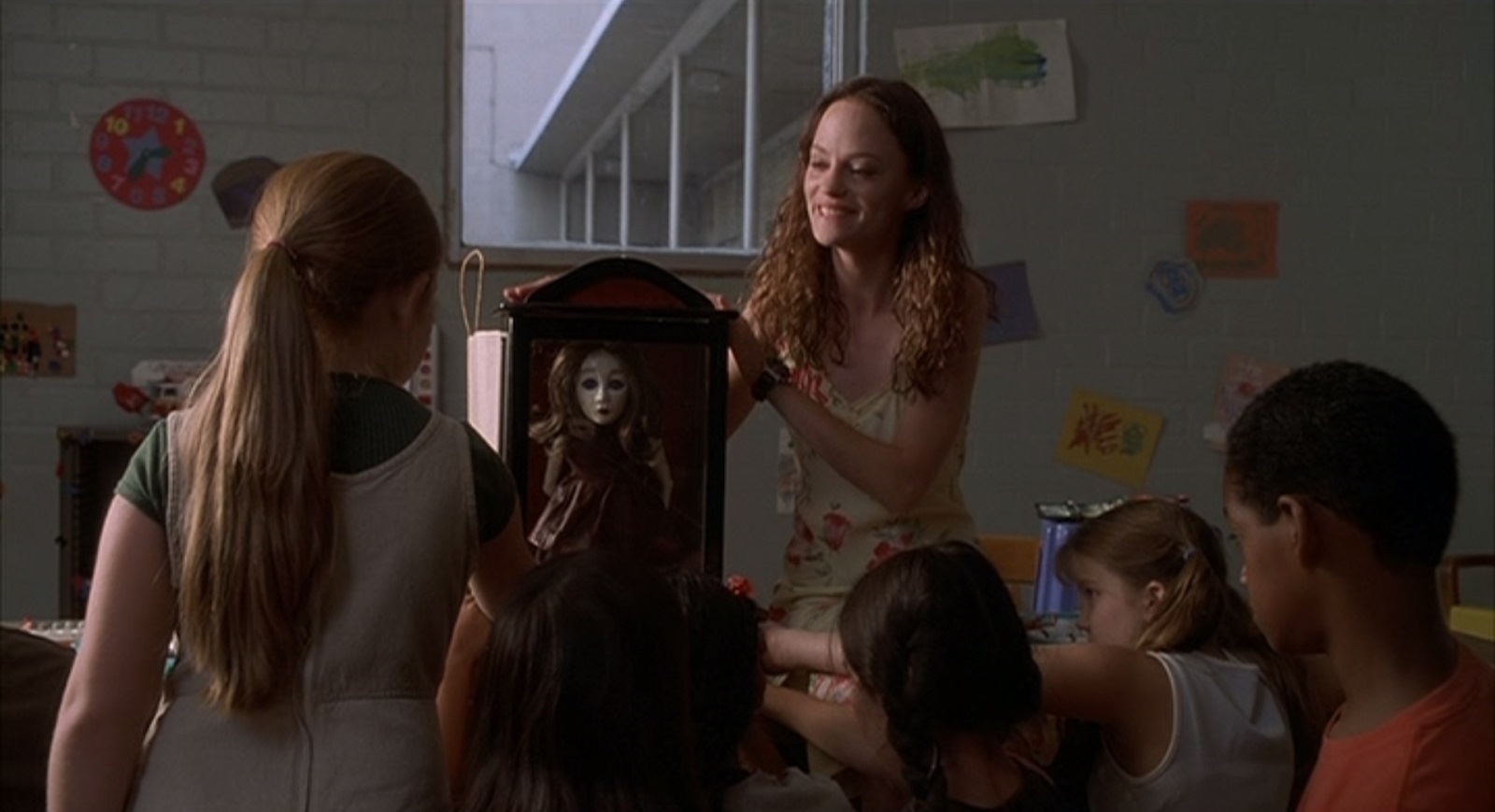 Angela Bettis shows her doll Suzie to the class of children in May (2002)