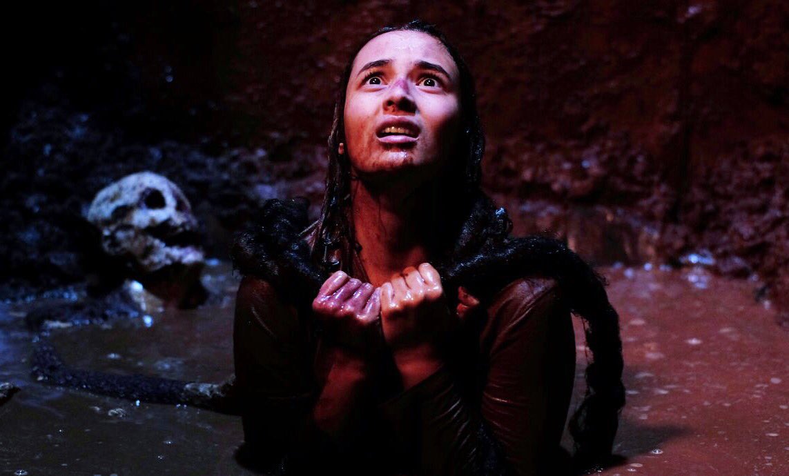 Chelsea Islan confronts the horrors in the cellar in May the Devil Take You (2018)