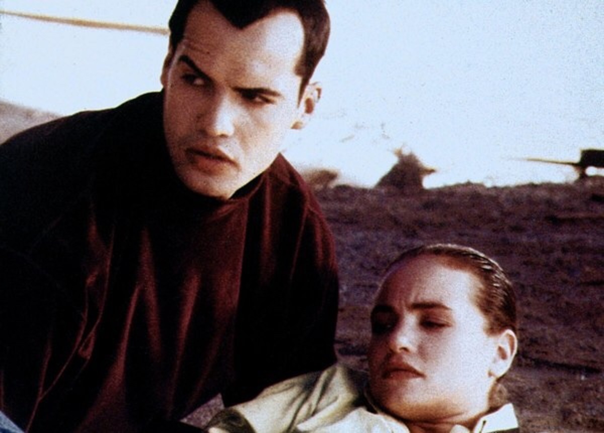 Billy Zane and Kristen Cloke in Megaville (1990)