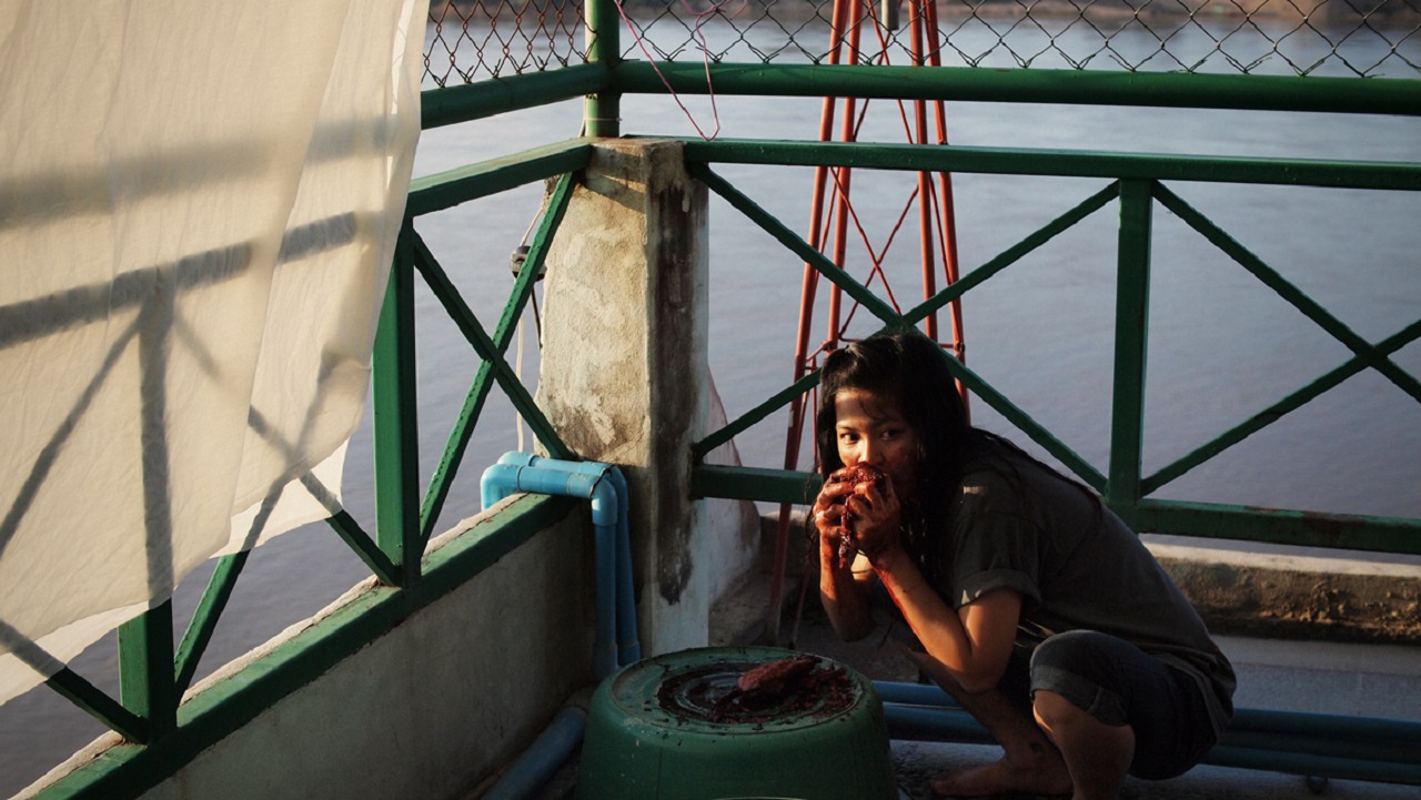 Chatchai Suban as the intestine-eating the pob ghost in Mekong Hotel (2012)