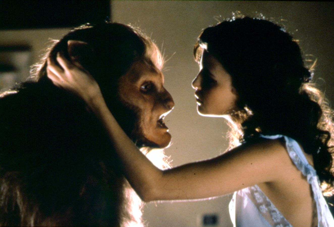 Sherilyn Fenn and the werewolf Malcolm Jamieson in Meridian (1990)