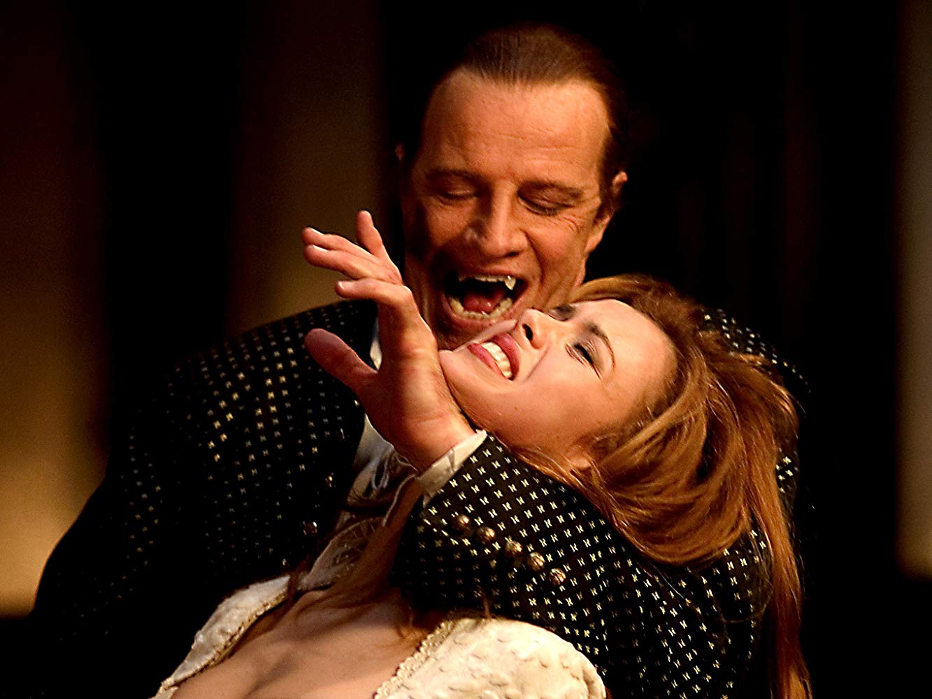 Christopher Lambert puts the bite on Irena A. Hoffman in Metamorphosis (2007)