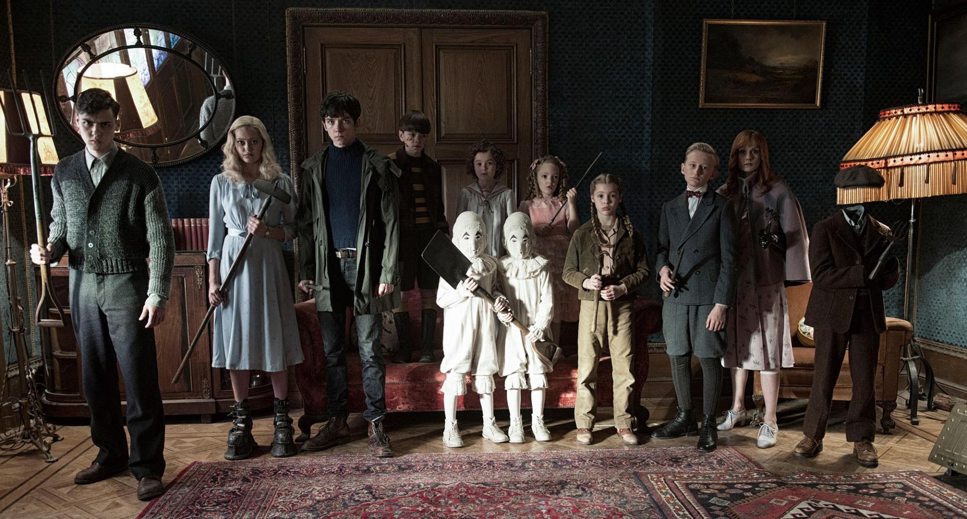 The Peculiar Children - (l to r) Enoch O'Connor (Finlay MacMillan), Emma Bloom (Ella Purnell), Jake Portman (Asa Butterfield), Hugh Apiston (Milo Parker), The Twins (Joseph Odwell and Thomas Odwell), Bronwyn Bruntley (Pixie Davies), Claire Densmore (Raffiella Chapman), Fiona Frauenfeld (Georgia Pemberton), Horace Somnusson (Hayden Keeler-Stone), Olive Abroholos Elephanta (Lauren McCrostie) and Millard Nullings (Cameron King) in Miss Peregrine's Home for Peculiar Children (2016)