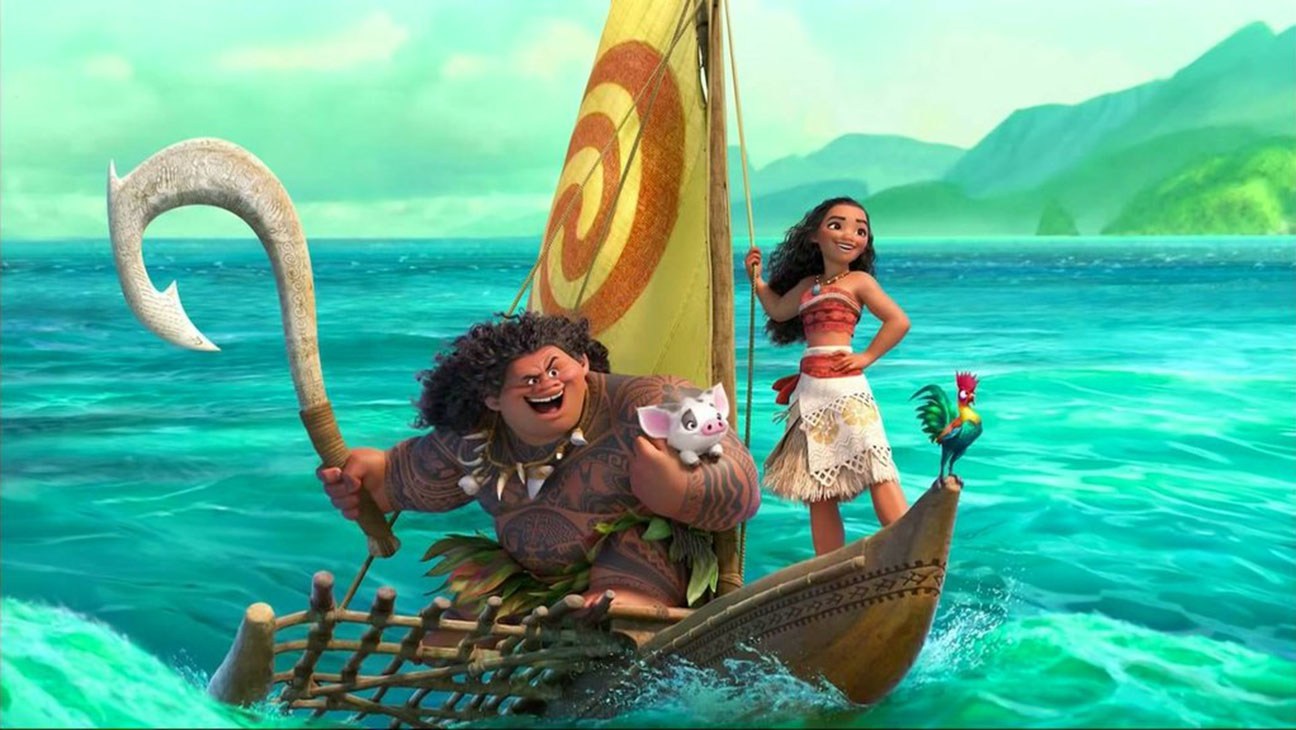 Maui (voiced by Dwayne Johnson) and Moana (voiced by Auli’i Cravalho) set sail accompanied by Pua the pig and Heihei the rooster (voiced by Alan Tudyk) in Moana (2016)
