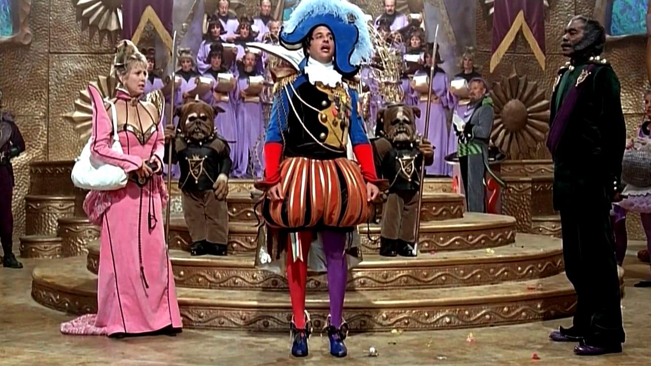 (l to r) Marge Nelson (Teri Garr), Emperor Tod Spengo (Jon Lovitz) and his general Thalmus Rasulala in Mom and Dad Save the World (1992)