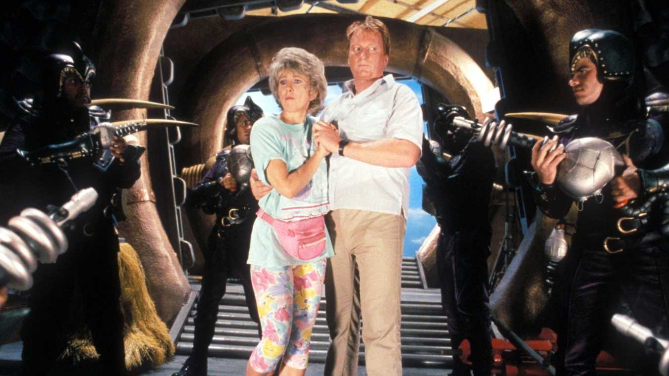 Dick and Marge Nelson (Jeffrey Jones and Teri Garr) arrive on the planet Spengo in Mom and Dad Save the World (1992)