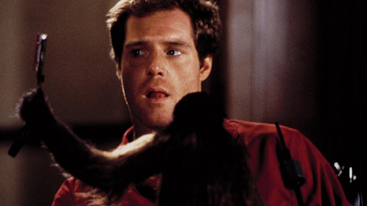 Ella picks up a razor and turns against Jason Beghe in Monkey Shines (1988)