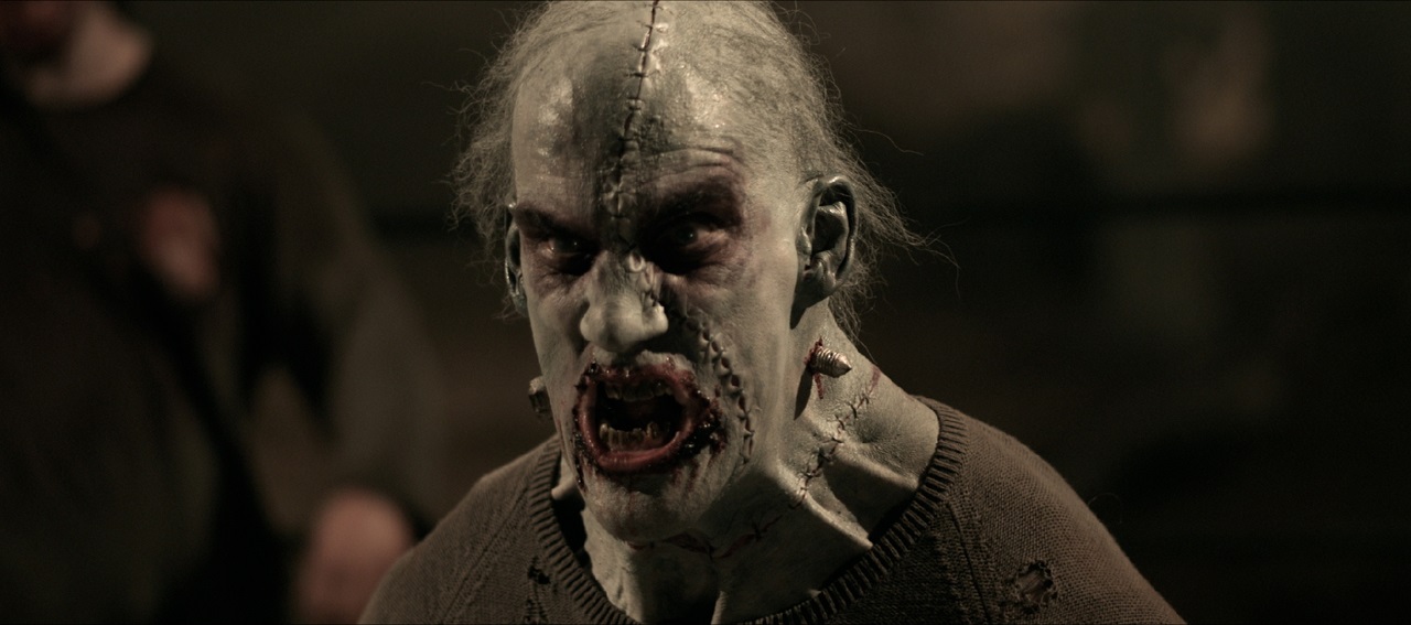 Zombie Man (Rico Montana) in Monster Brawl (2011)