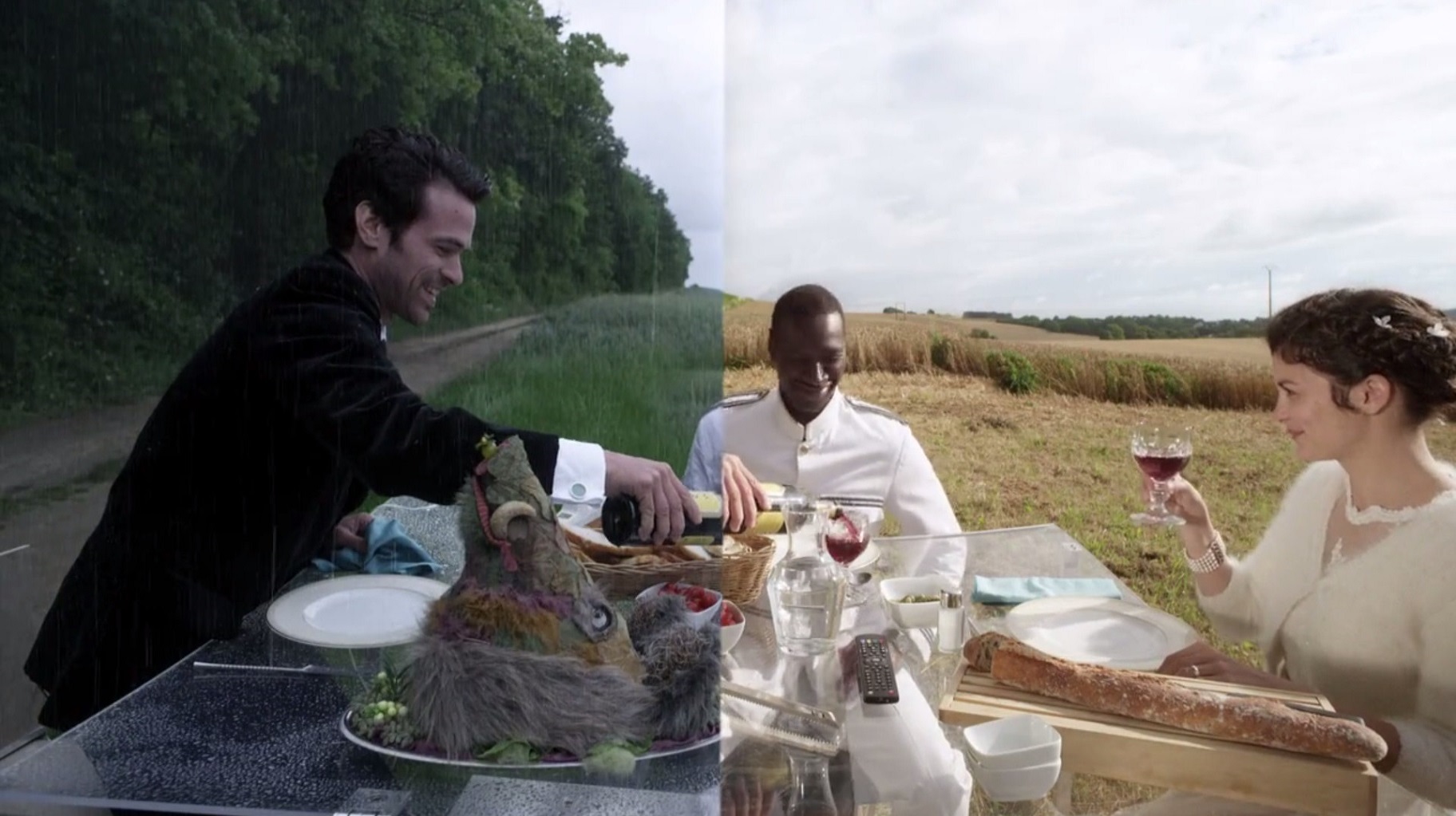 (l to r) Romain Duris, Mos Def and Audrey Tautou stop for a picnic where on one side of the screen it rains and on the other it remains sunny in Mood Indigo (2013)