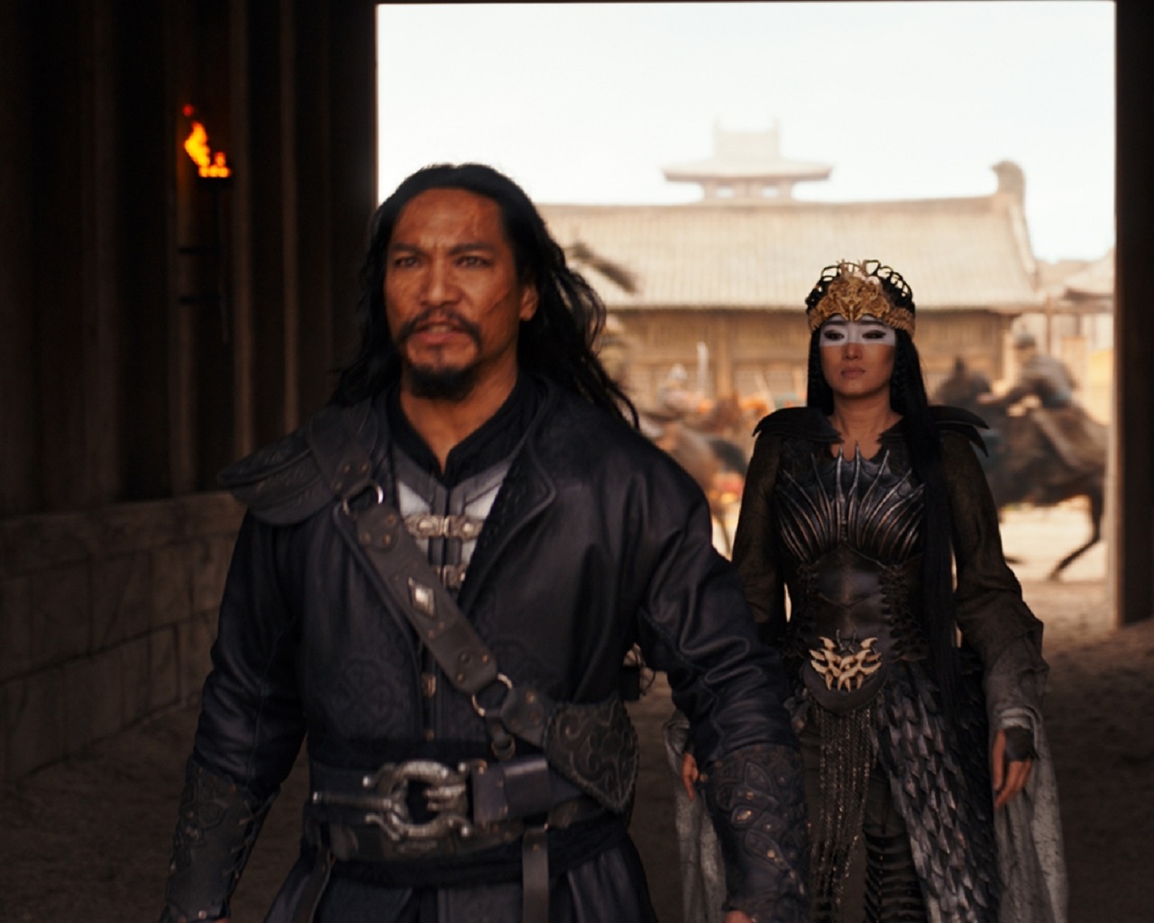 The invading warlord Bori Khan (Jason Scott Lee) and the sorceress Xiannlang (Gong Li) in Mulan (2020)