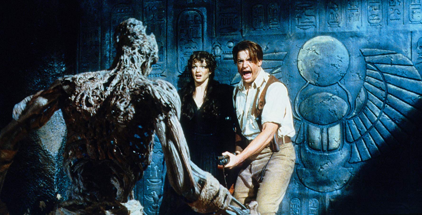 Rachel Weisz and Brendan Fraser face a zombified priest in The Mummy (1999)