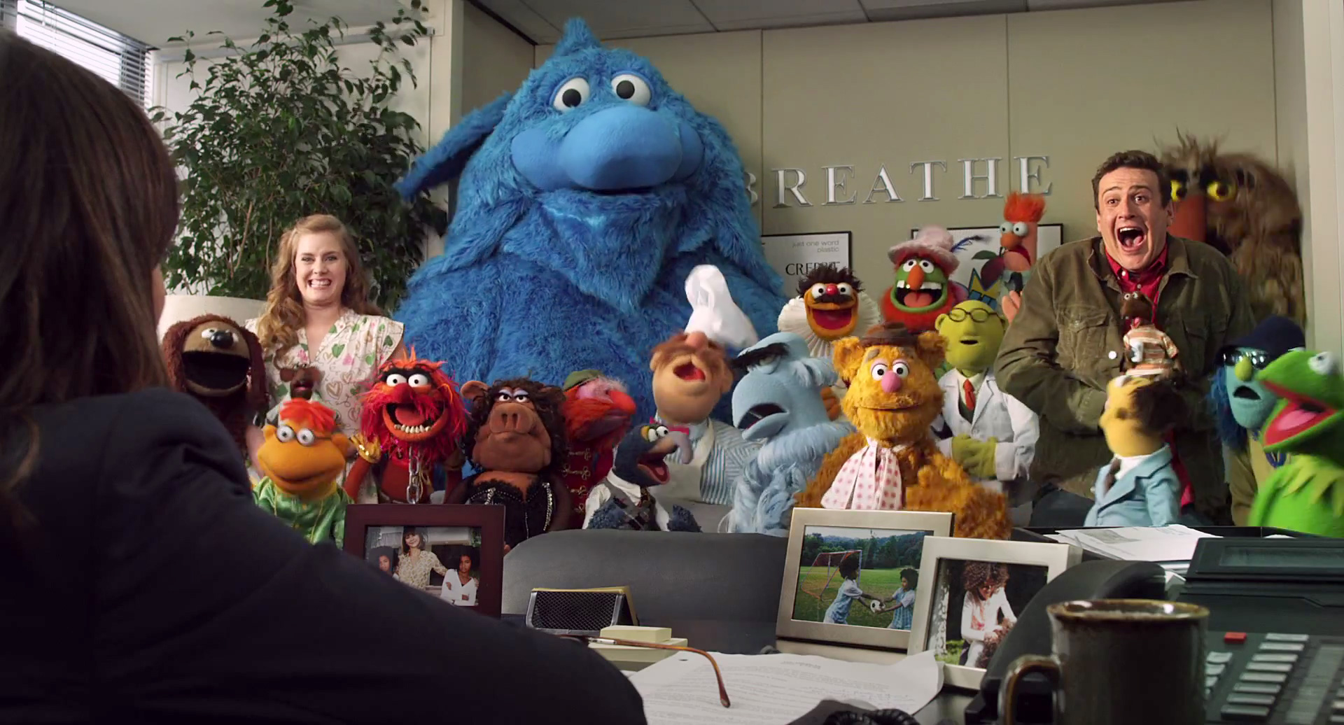 The Muppets along with Amy Adams and Jason Segel in The Muppets (2011)