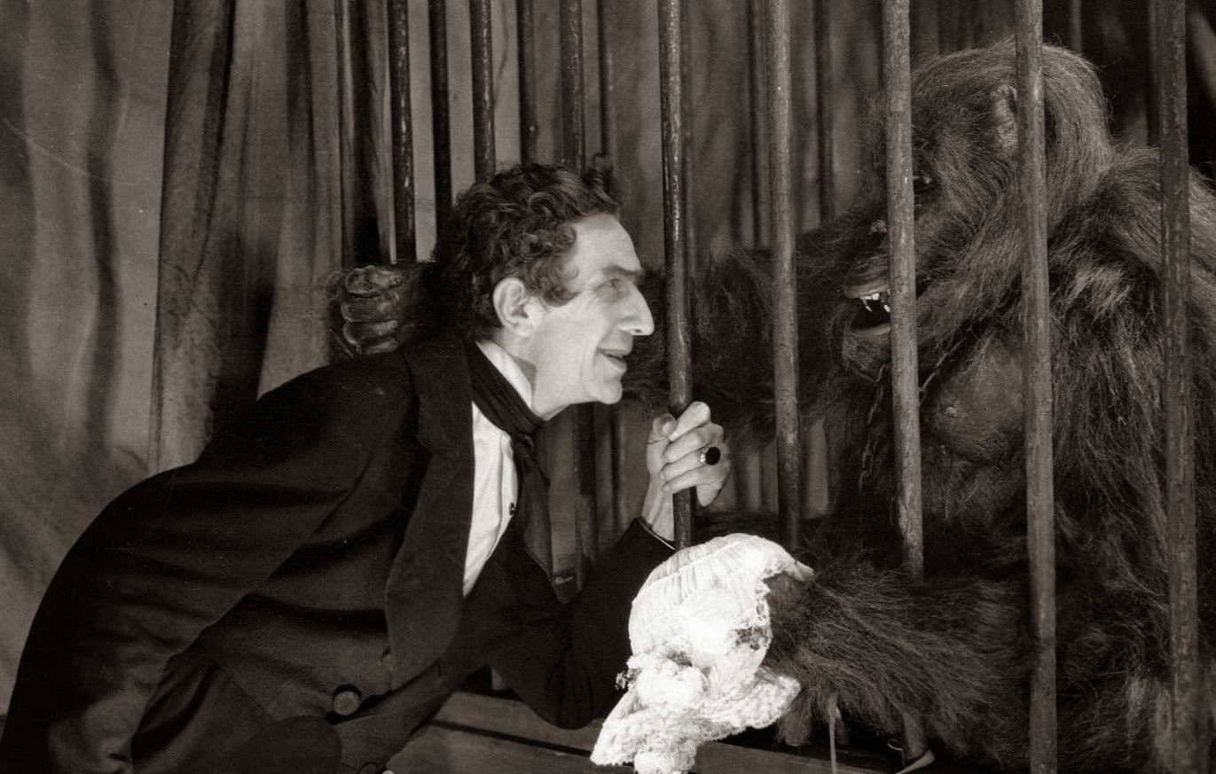 Dr Mirakle (Bela Lugosi) and his gorilla Erik in Murders in the Rue Morgue (1932)