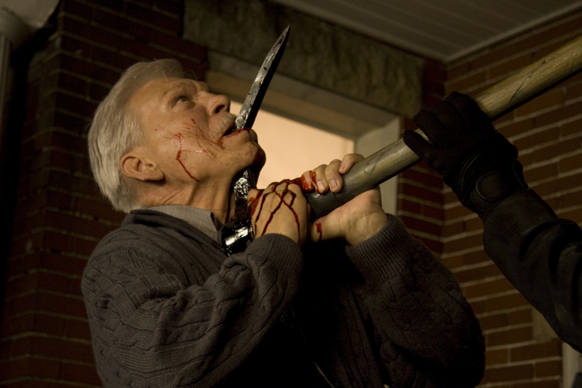 Tom Atkins gets a pickaxe through the jaw in My Bloody Valentine (2009)