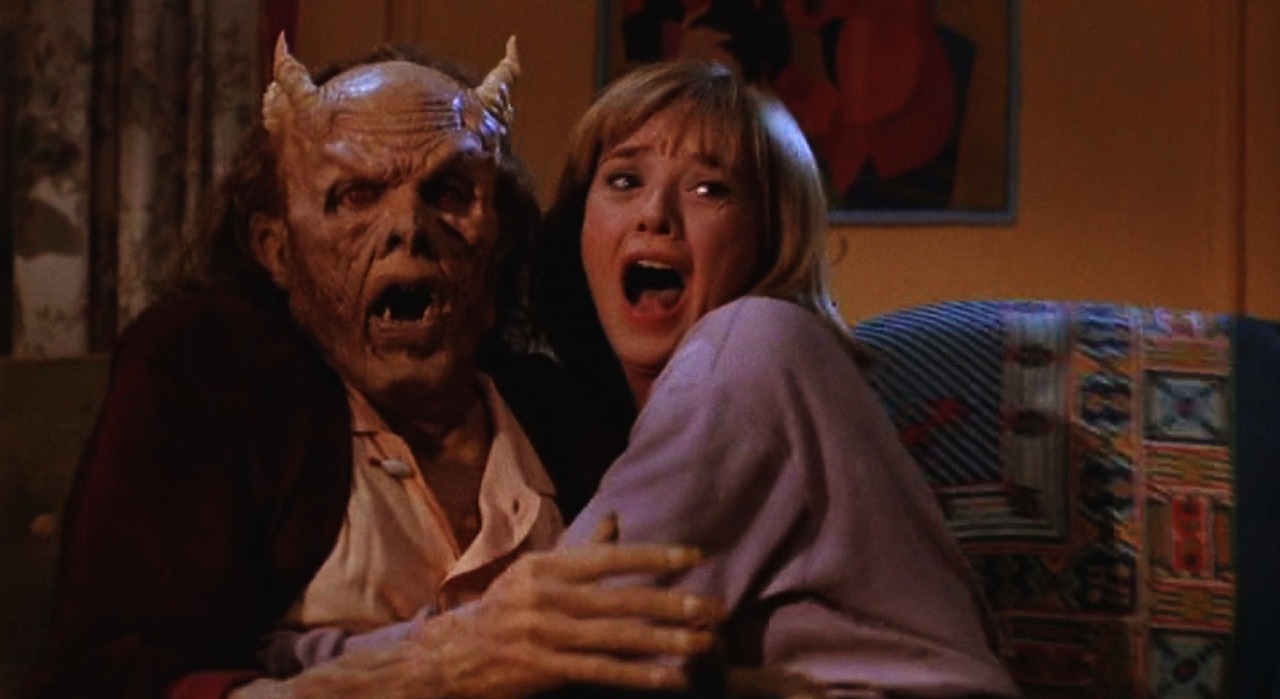 A demonic Scott Valentine with Michelle Little in My Demon Lover (1987)