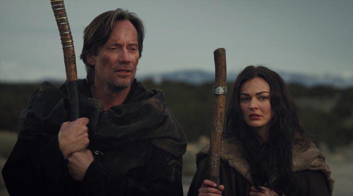 Marek (Melanie Stone) and her mentor Gojun Pye (Kevin Sorbo) in Mythica: The Necromancer (2015)