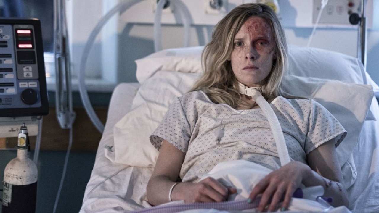 A hospitalised Shauna MacDonald in Nails (2017)