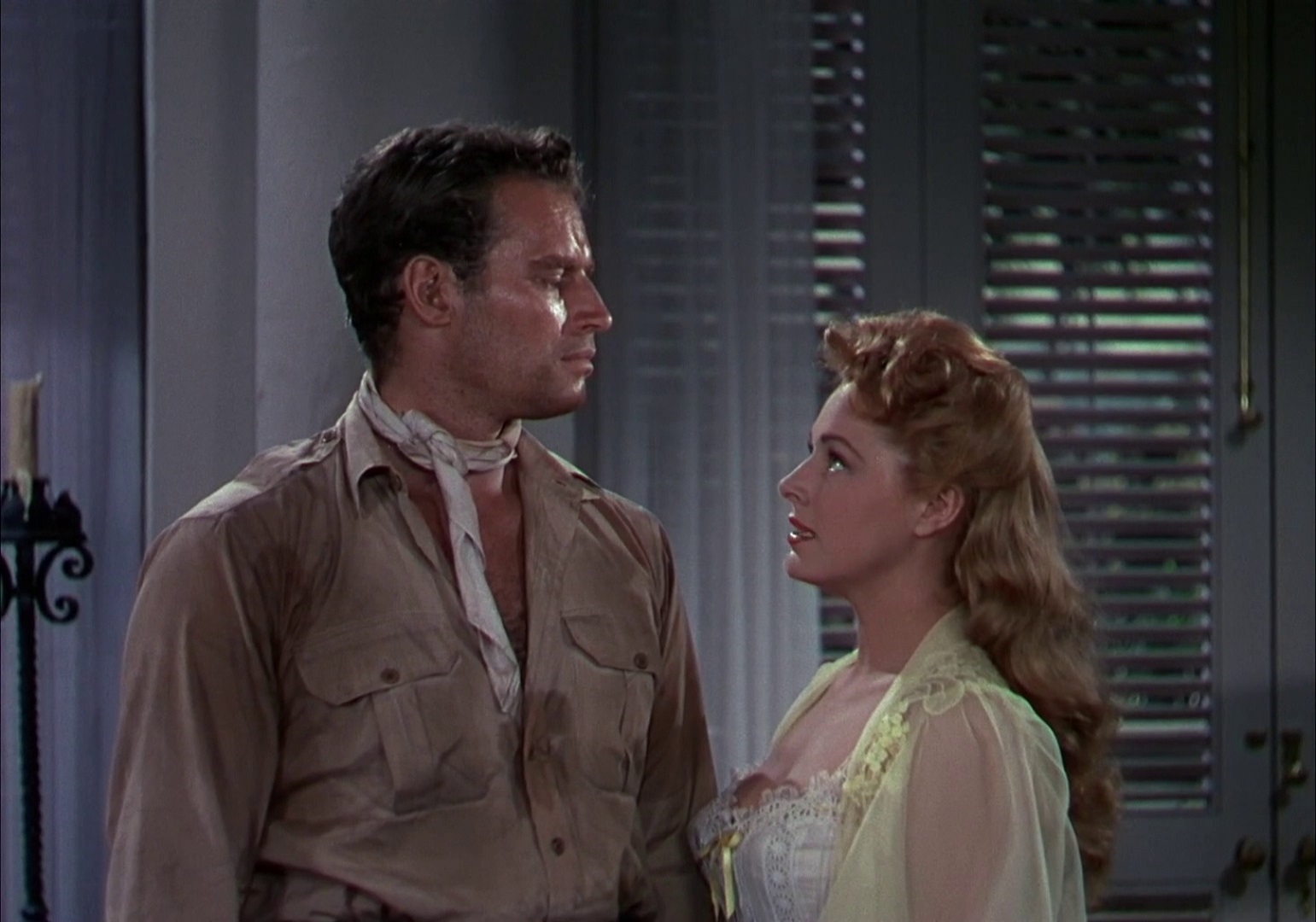 Charlton Heston and Eleanor Parker in The Naked Jungle (1954) poster