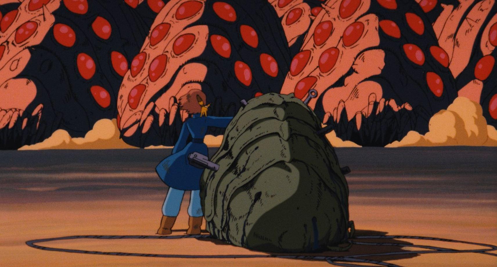 Nausicaa stands in the path of the sea of Ohms in Nausicaa in the Valley of the Wind (1984)