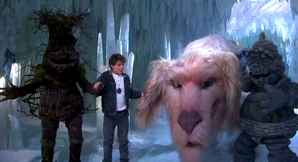 Bastian (Jason James Richter) surrounded by (l to r) Barky, The Luckdragon and Junior Rockbiter in The Neverending Story III (1994)