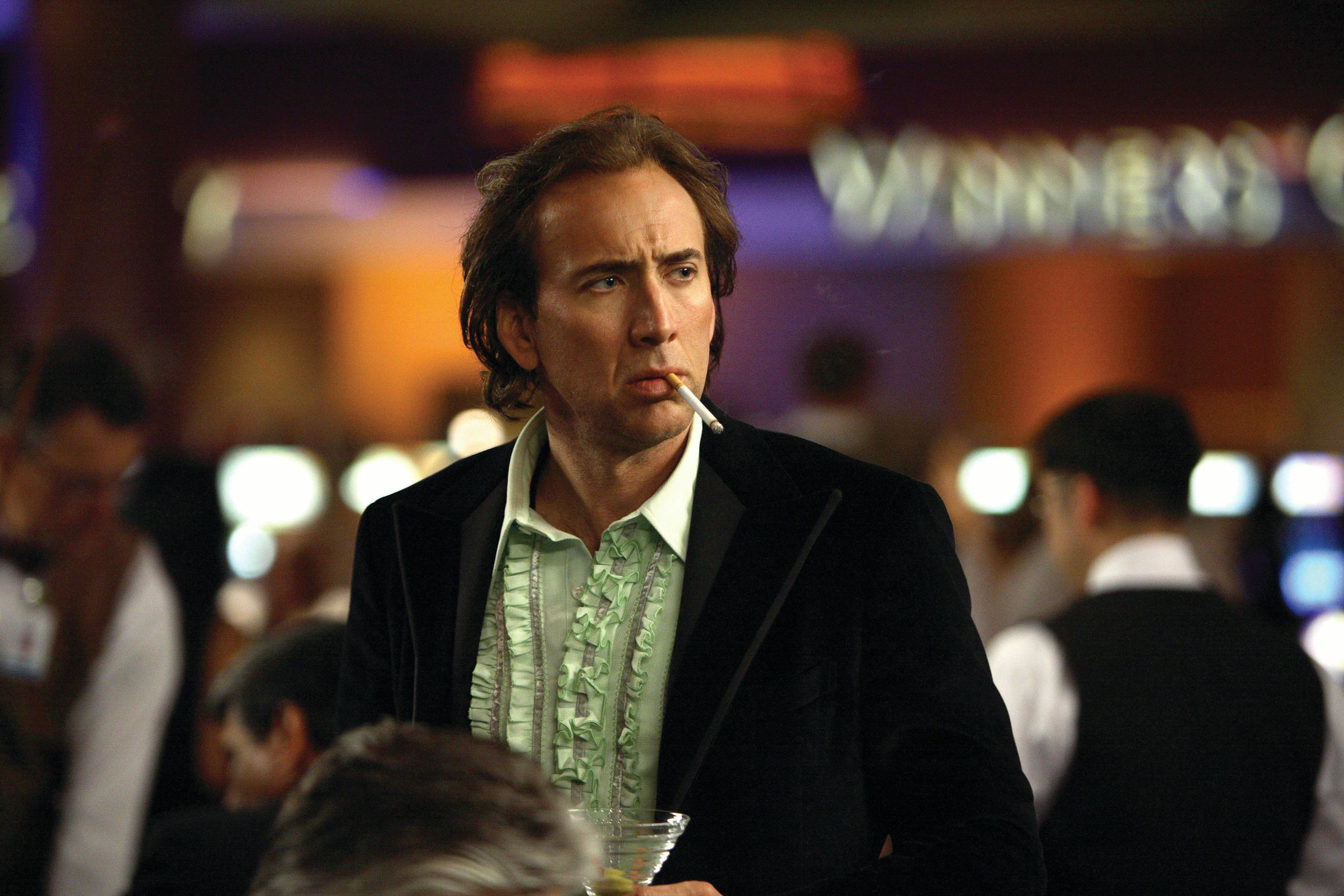 Nicolas Cage as a shabby Las Vegas magician with clairvoyant abilities in Next (2007)