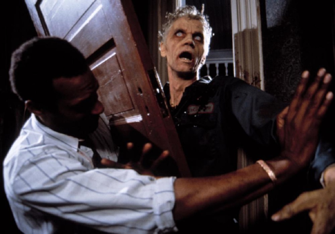 Ben (Tony Rodd) fends off the zombies in Night of the Living Dead (1990)