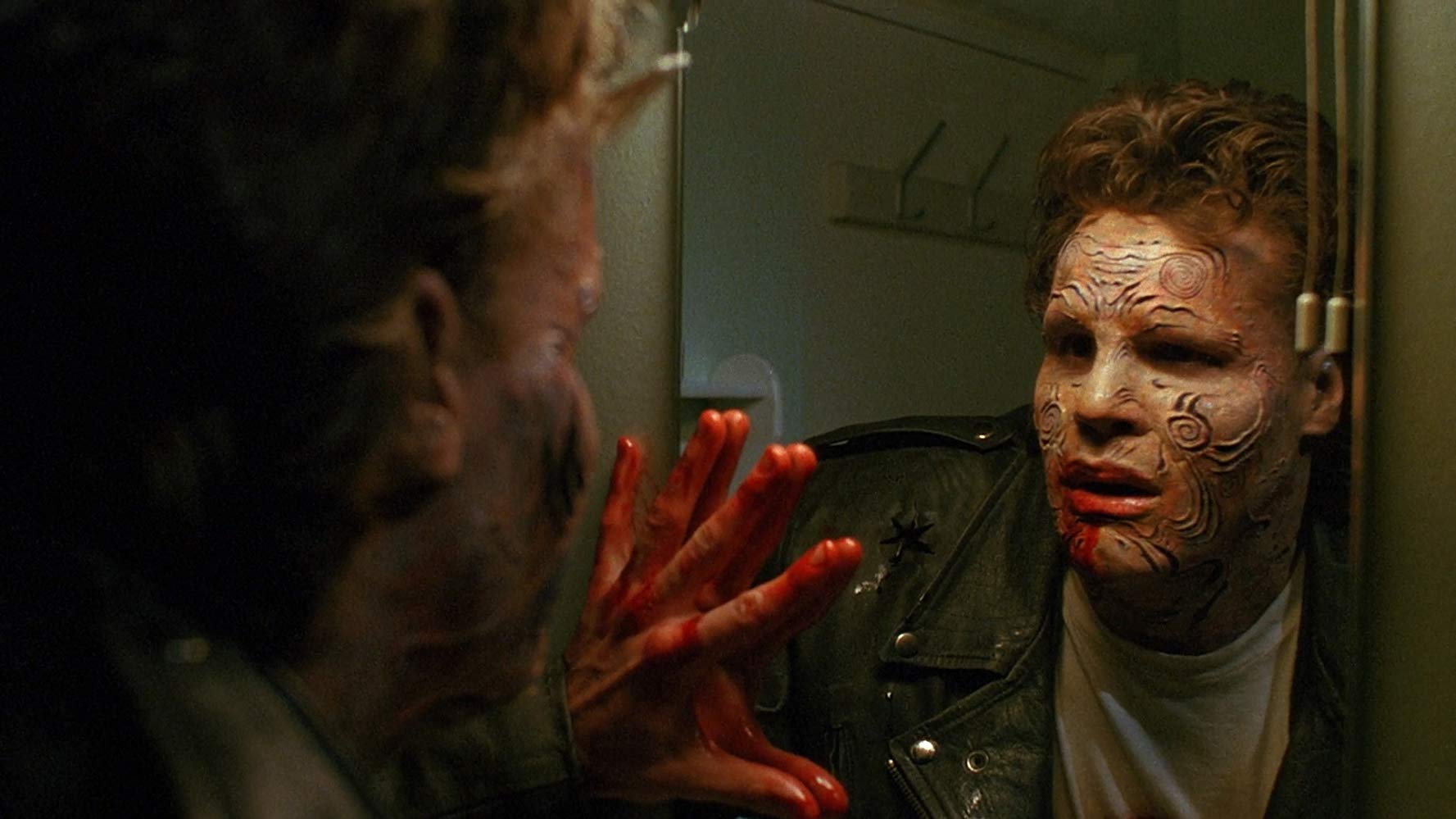 Boone (Craig Sheffer) discovers he is transforming into a monster in Nightbreed (1990)