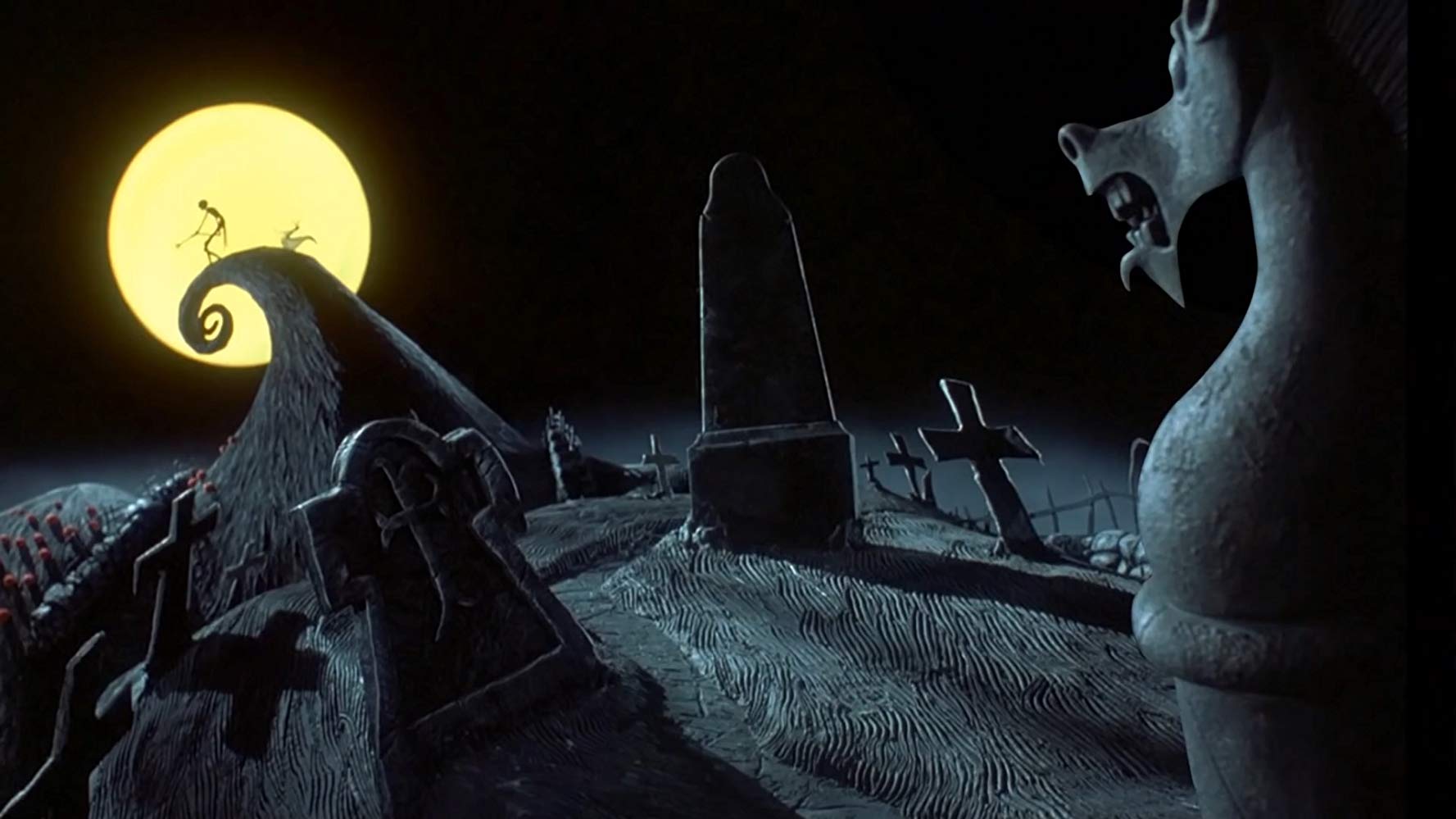 Jack Skellington stands over the graveyard in Halloween Town in The Nightmare Before Christmas (1993)