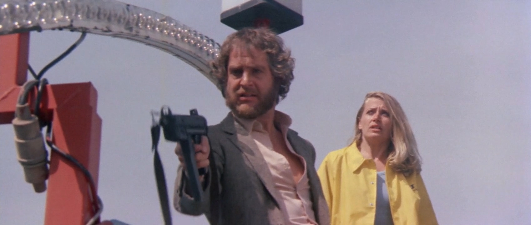 Hugo Stiglitz and Laura Trotter in Nightmare City (1980)