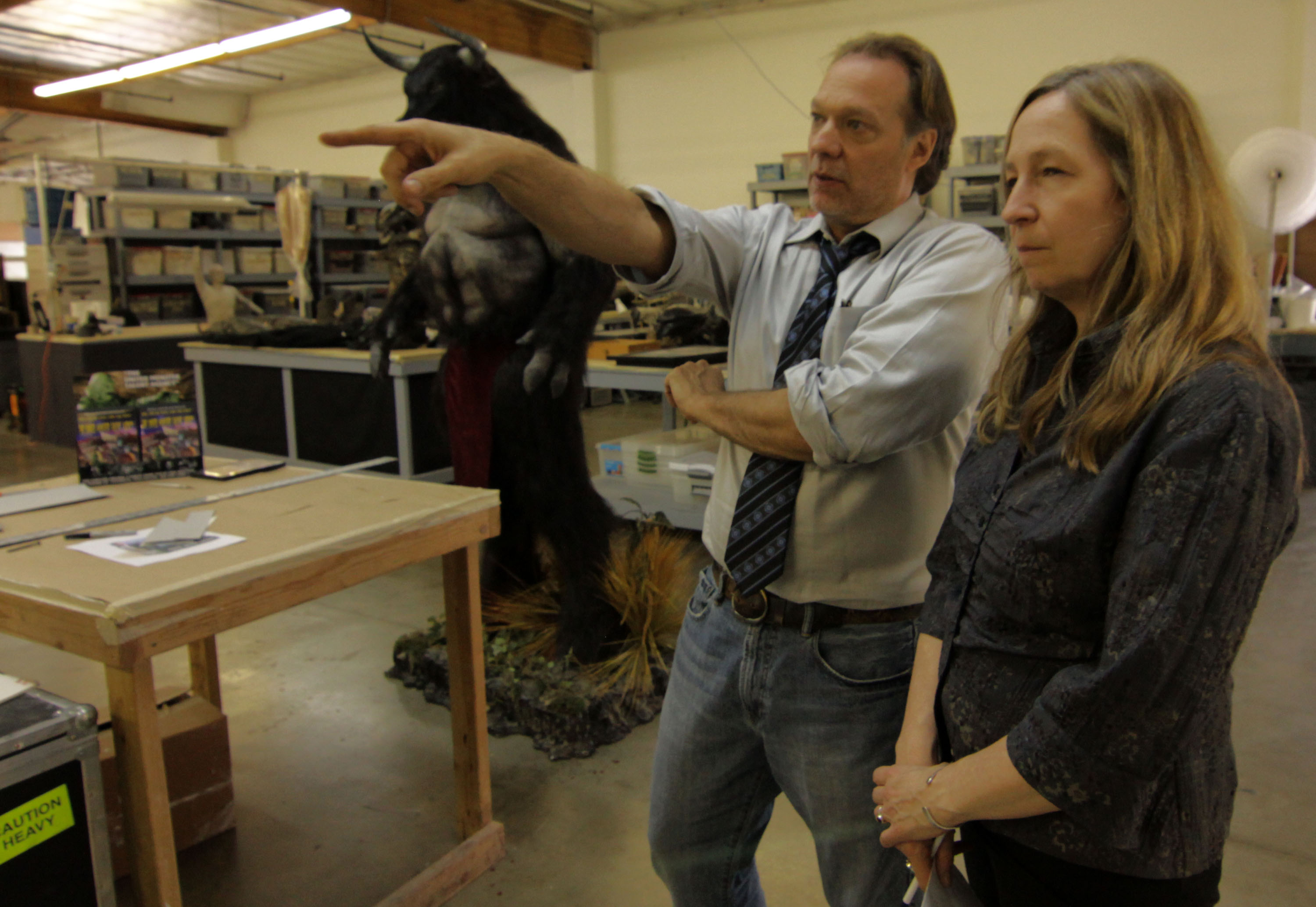 Greg Nicotero shows director Donna Davies around the K.N.B studio in Nightmare Factory (2011)