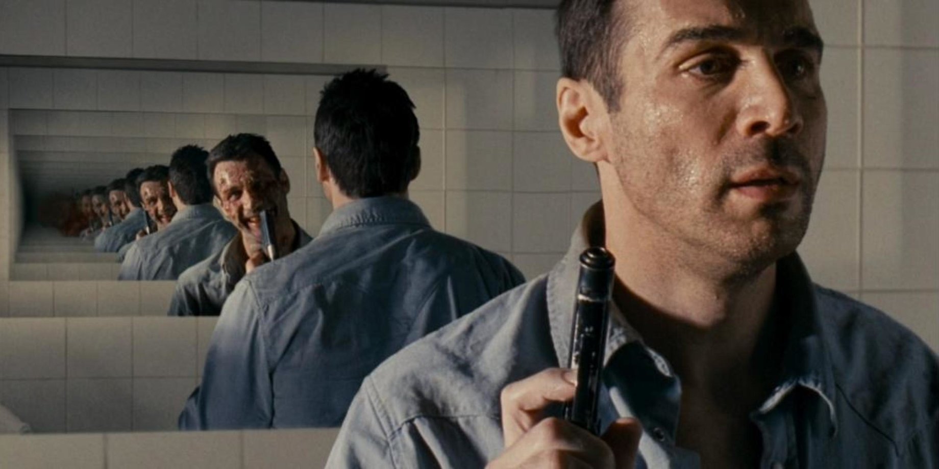 Adrian Paul haunted by his own reflection in Nine Miles Down (2009)