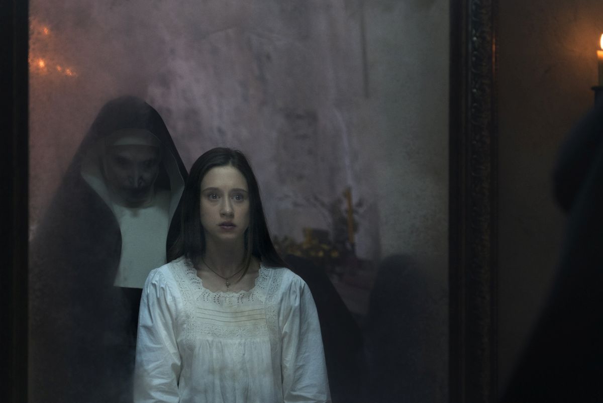 The Nun appears to Sister Irene (Taissa Farmiga) in The Nun (2018)