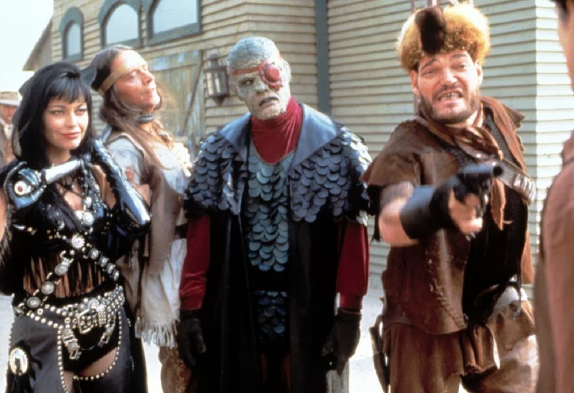 Redeye and his gang arrive in town - (l to r) Lash (Musetta Vander), Buteo (Jimmie F. Skaggs), Redeye (Andrew Divoff) and Bork (Irwin Keyes) in Oblivion (1994)