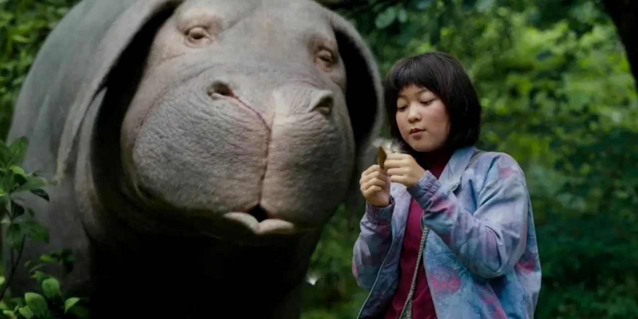 Joo Mija (An Seo Hyun) and Okja the genetically-engineered giant pig in Okja (2017)