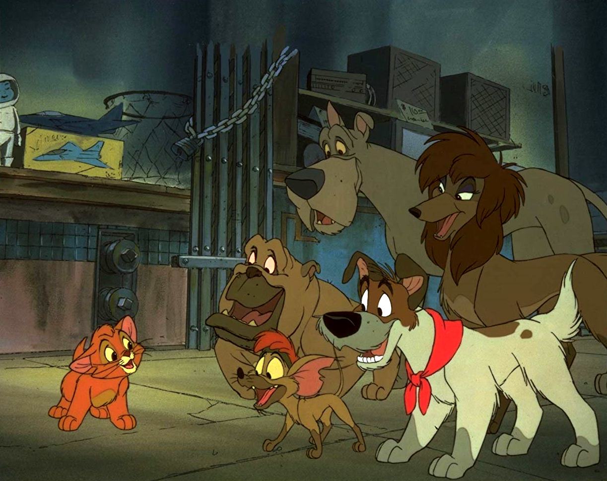 Oliver (voiced by Joey Lawrence) (l) falls in with Dodger (voiced by Billy Joel) (bottom r) and his company of stray dogs in Oliver & Company (1988)