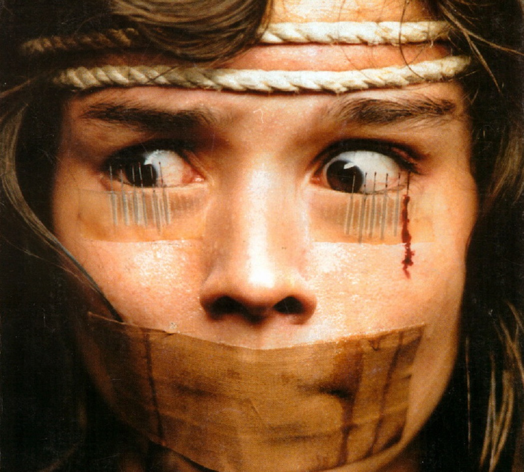 Cristina Marsillach ied up with needles taped under her eyelids in Opera (1987)