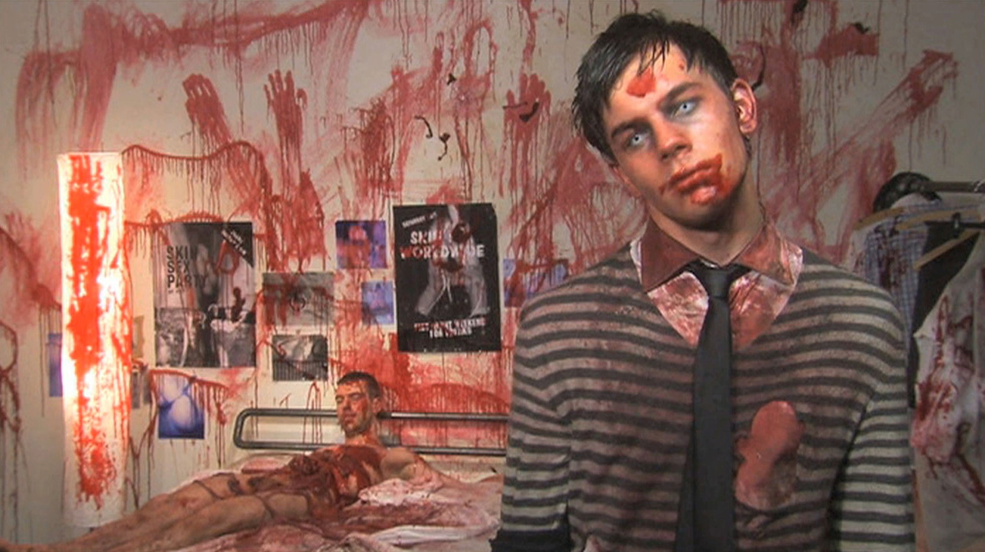 Otto the zombie (Jey Crisfar) with the corpse of one of his liaisons in Otto; or, Up With Dead People (2008)