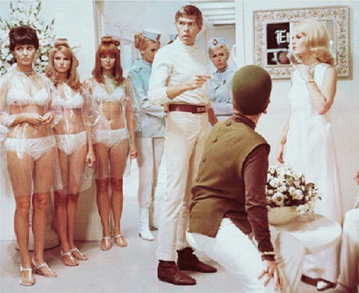 Derek Flint (James Coburn) and a bevy of women in Our Man Flint (1966)