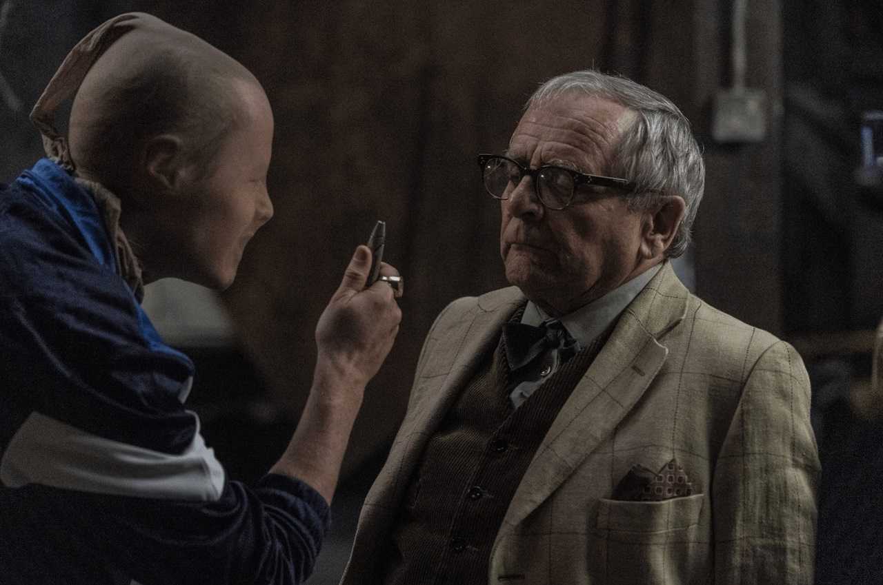 Jake Curran threatens Sylvester McCoy in The Owners (2020)