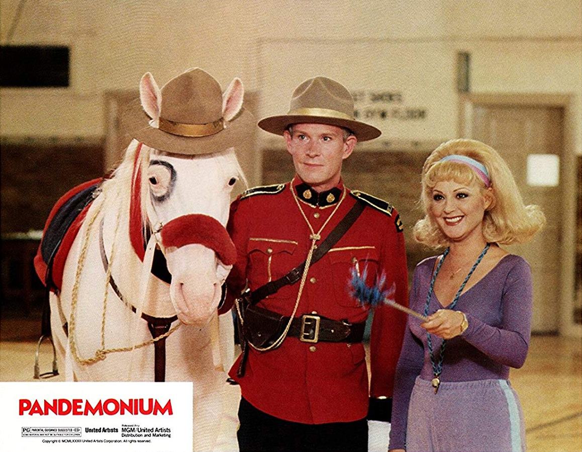 Tom Smothers as the Canadian Mountie who has unnatural affections for his horse and Candy Azzara as the head of the cheerleading school in Pandemonium/Thursday the 12th (1982)