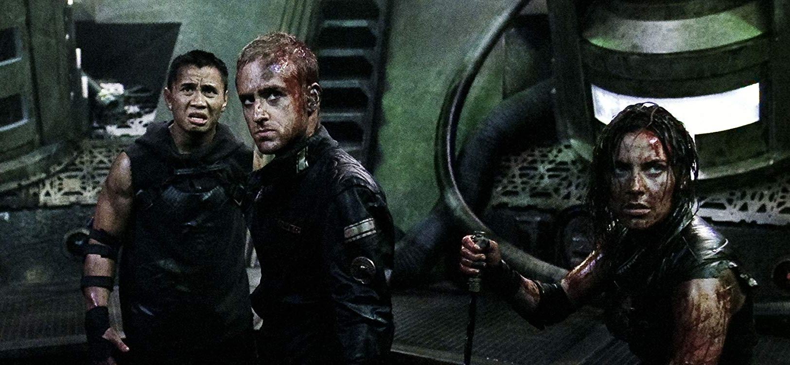 Survivors aboard The Elysium - (l to r) Cung Le, Ben Foster and Antje Traue in Pandorum (2009)