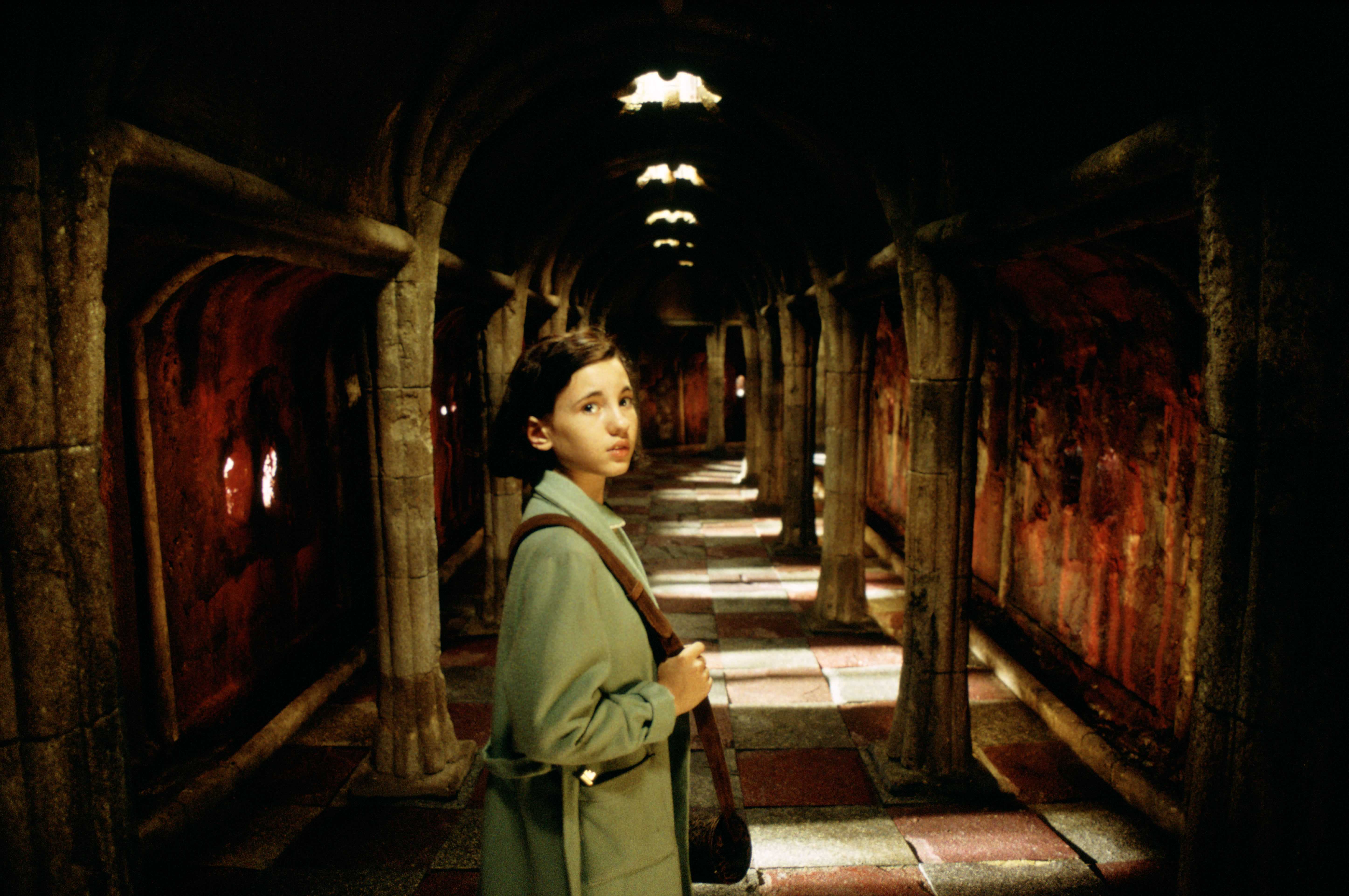 Ofelia (Ivana Baquero) makes her way into the labyrinth in Pan's Labyrinth (2006)