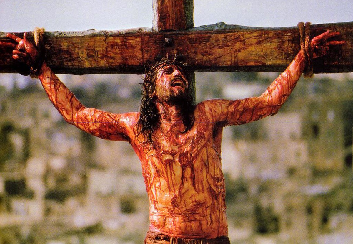 The crucifixion of Jesus (Jim Caviezel) in The Passion of the Christ (2004)