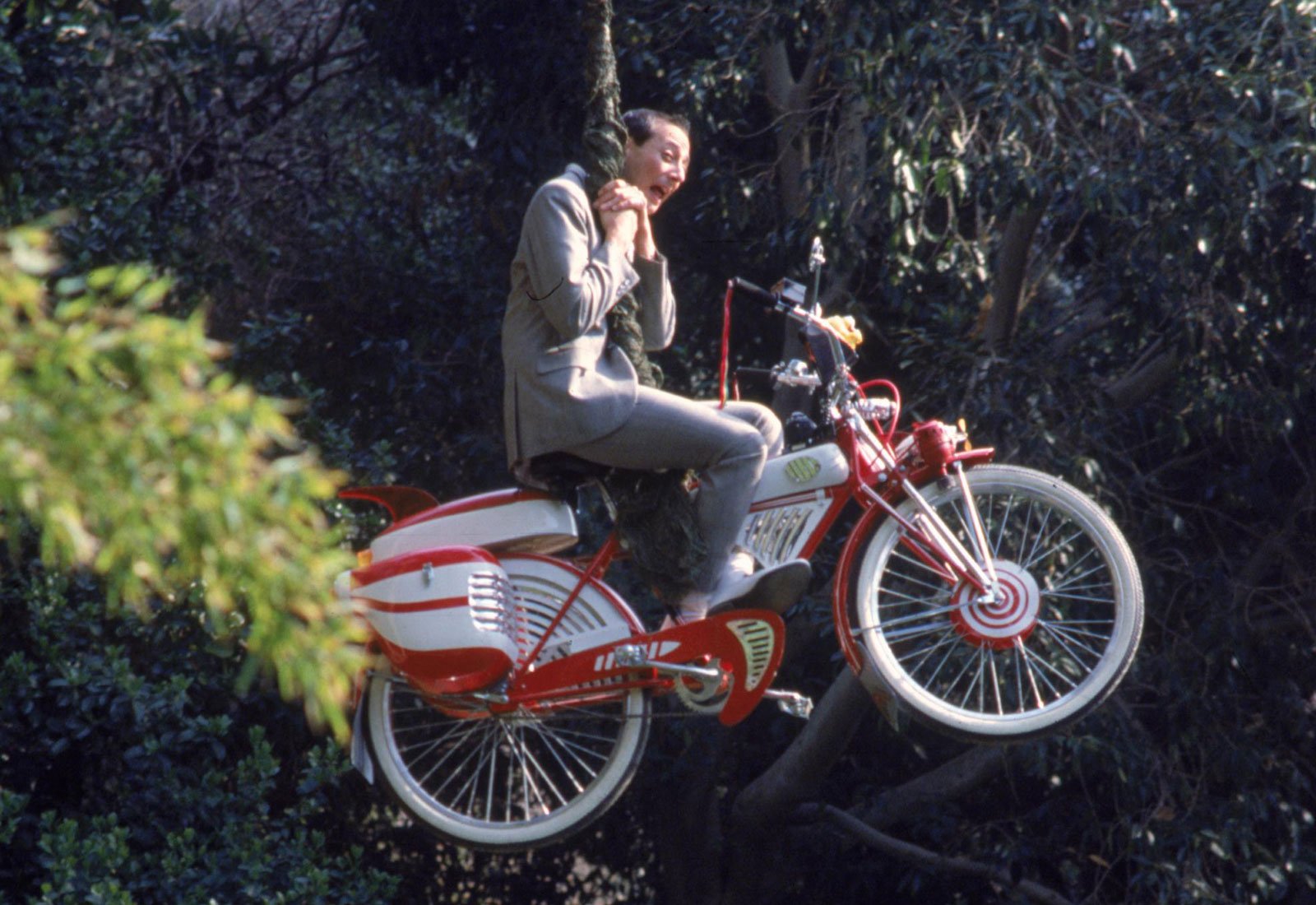 Pee-Wee Herman (Paul Reubens) swings into action on his beloved bicycle in Pee-Wee's Big Adventure (1985)