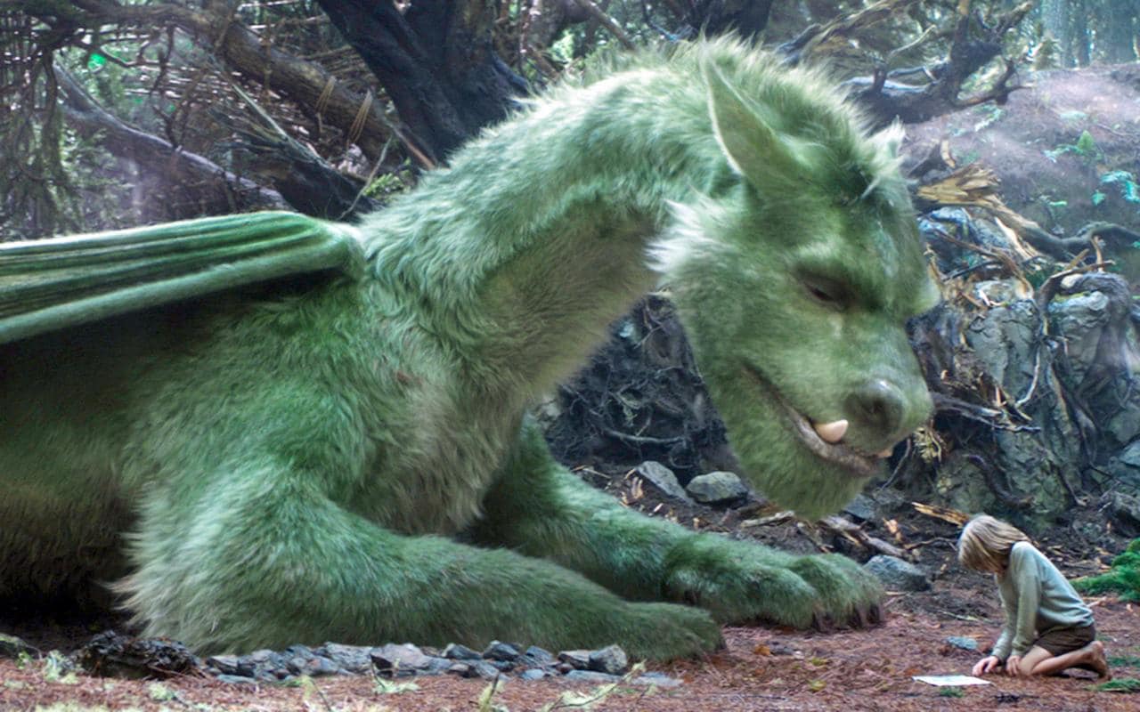 Pete (Oakes Fegley) and Elliott the dragon in Pete's Dragon (2016)