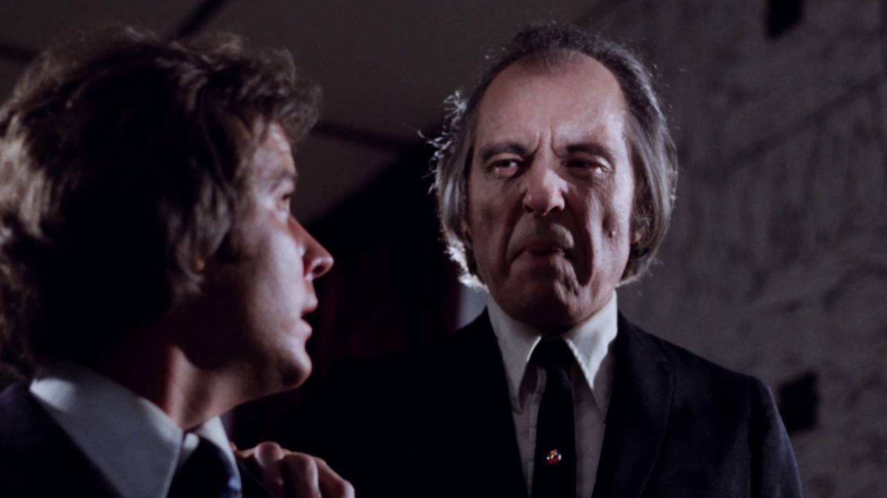 Tommy (Bill Cone) menaced by The Tall Man (Angus Scrimm) in Phantasm (1979)